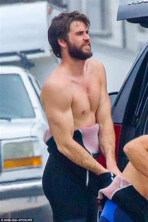 Shirtless Liam Hemsworth Hits The Waves Daily Mail Online