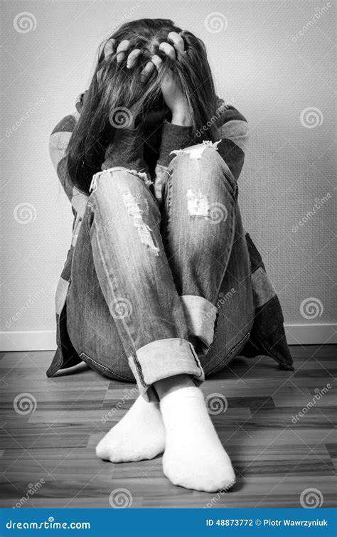depressed girl hiding face stock photo image  teenage
