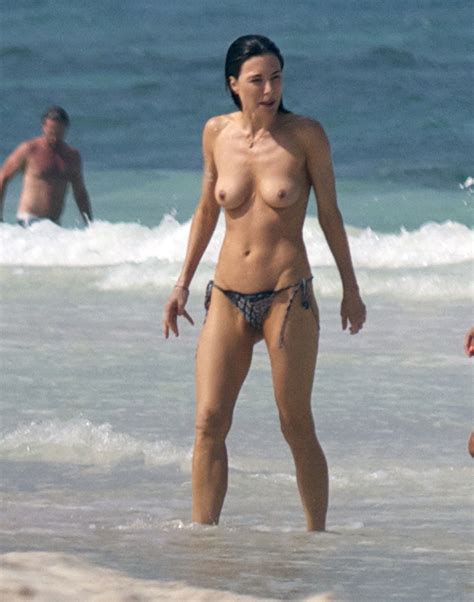 english actress jaime murray topless candids at a beach in mexico