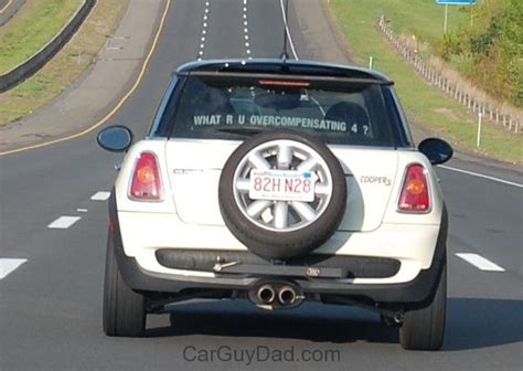mini coopers  equipped   spare tire car news box