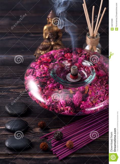 buddha statue essential oils incense sticks and stones massage stock image image of incense