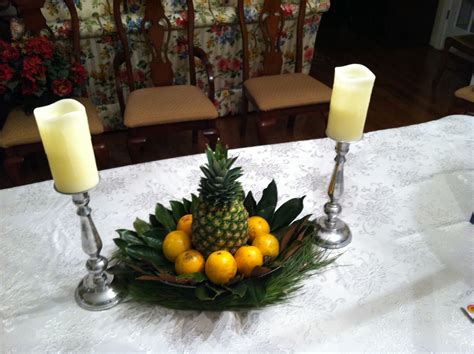 magnolia leaves and a pineapple centerpiece pineapple