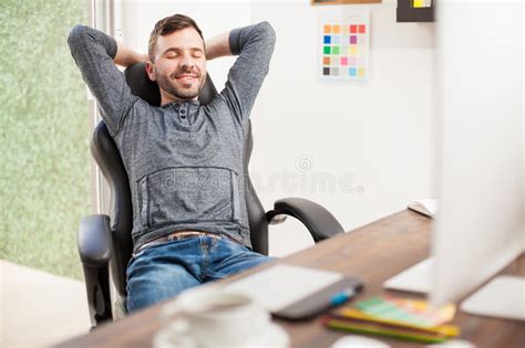 happy freelancer taking a break from work stock image
