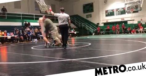 dad slams son s opponent to floor after he beats him in wrestling match