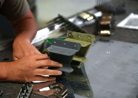 usaf airman develops  printed metal bracket      fleet manufacturd