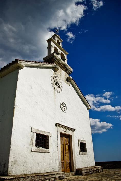 white church stock photo image  cloudy murter croatia