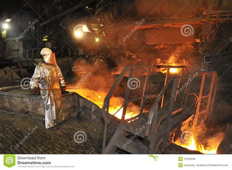 molten hot steel pouring  worker royalty  stock images image