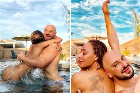 mel b poses totally naked with her best friend in a swimming pool for risque social media snaps