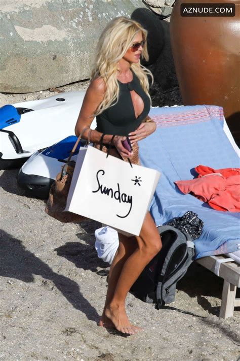 victoria silvstedt flashes her boobs at the beach in st barts france