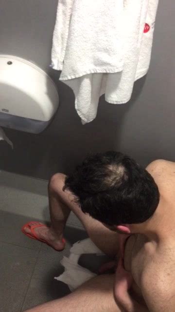 man naked on gym toilet