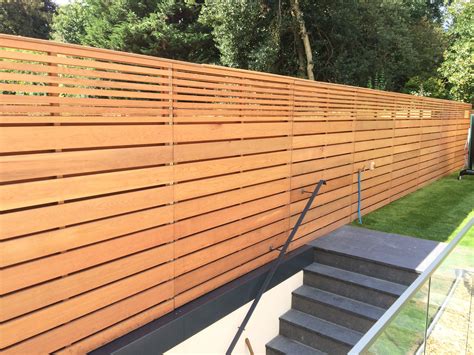 cedar slatted fencing   combination  large  smaller slats    double sided