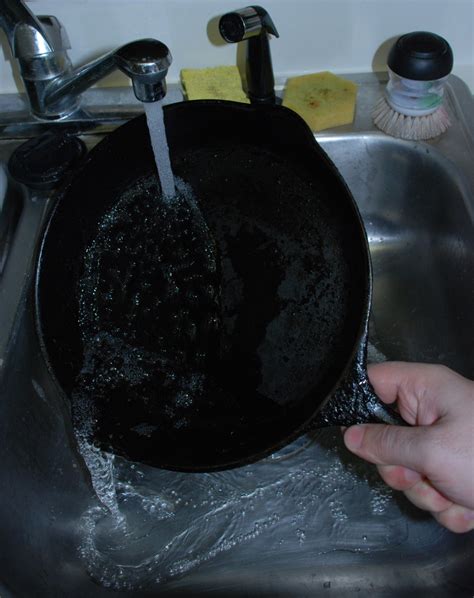 clean  cast iron pan  baking soda  elbow grease delishably