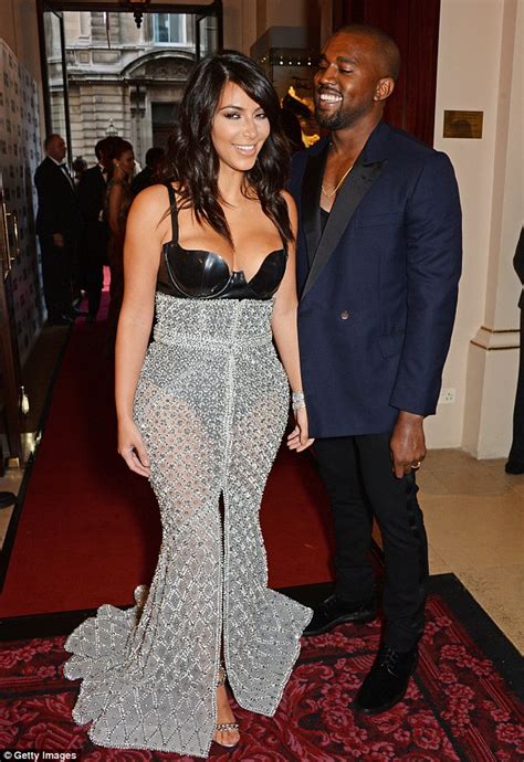 kim kardashian and kanye west have private moment at gq awards in toilet daily mail online