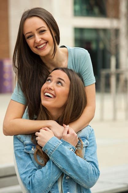 Premium Photo Girlfriends Having Fun Laughing And Hugging