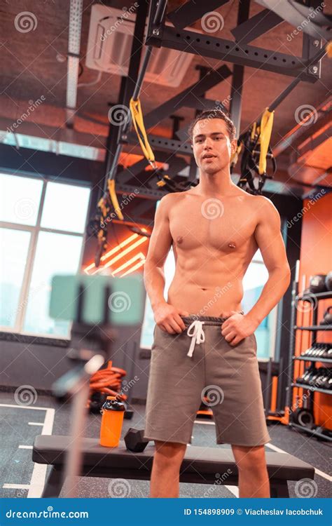 nice  built man standing   gym stock image image  body sportive