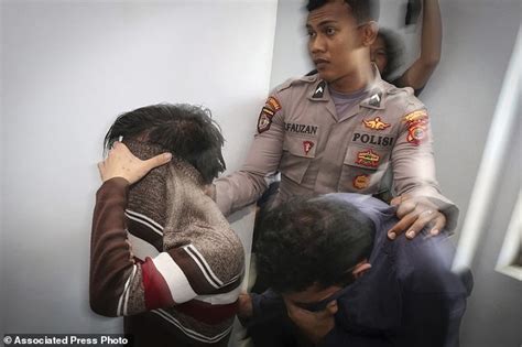 shariah court in indonesia sentences gay couple to caning