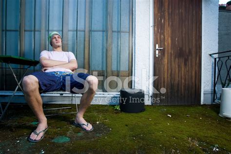 man sitting  backyard stock photo royalty  freeimages