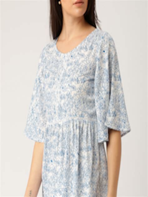 buy    women white blue printed loose fit peplum top tops  women  myntra