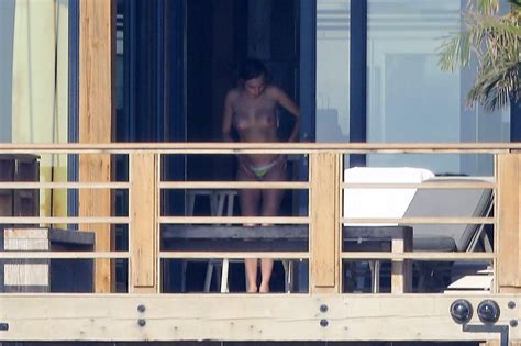 cara delevingne topless on a balcony in malibu scandal