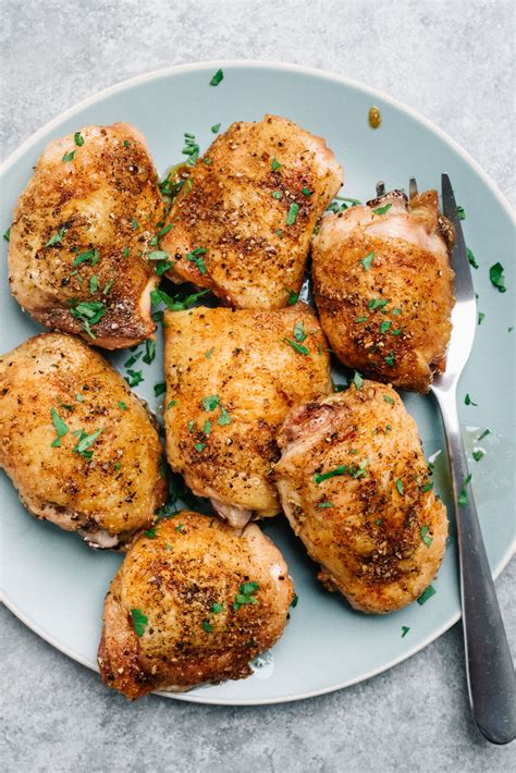 crispy baked chicken thighs easy weeknight dinner  spicy apron