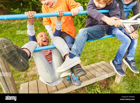 kids playing  jungle gym  res stock photography  images alamy