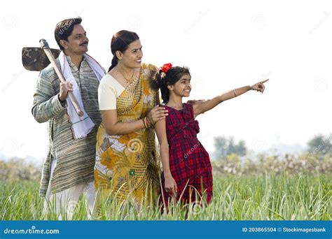 happy indian family  agricultural field stock photo image