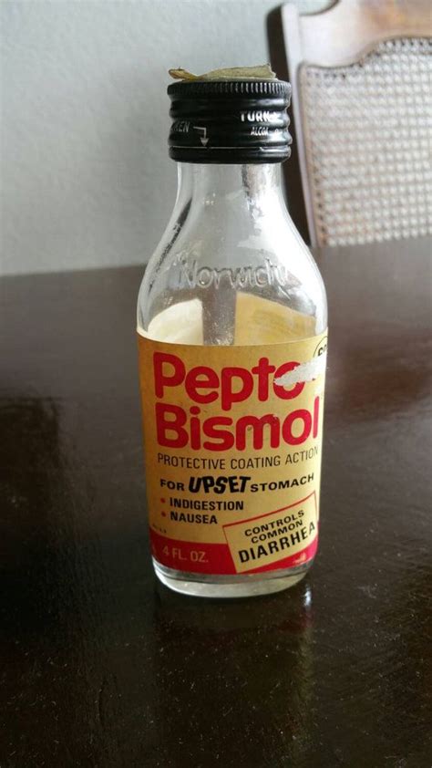 vintage  pepto bismol  medicine bottle label  intact  medicine bottles bottle