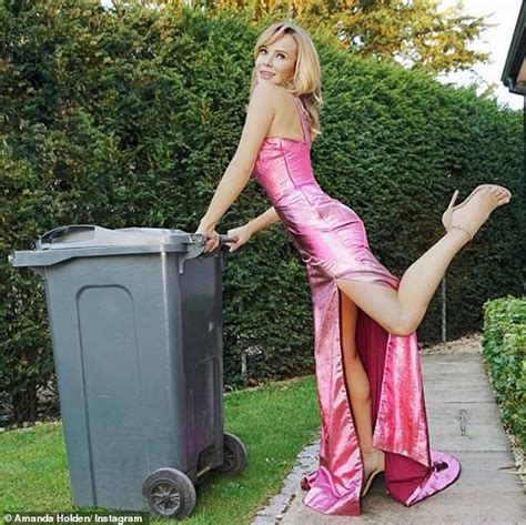 Alan Carr Takes Out His Bin In A Sparkling Silver Jumpsuit