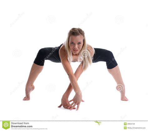 young blond woman stand  spider yoga pose stock photo image