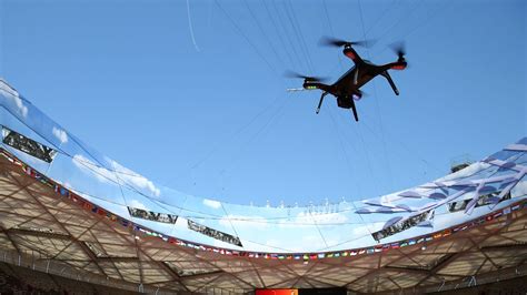 scolding  faa dallas cowboys  permission  fly drones  practice  verge