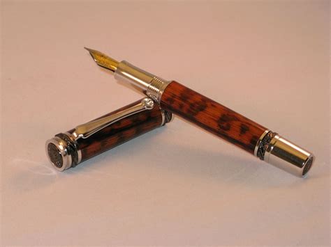hand crafted snakewood fountain  handmade wooden   cronin