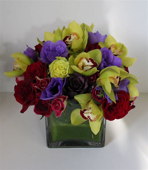 Anemone Rose And Cymbidium Orchid Arrangement With