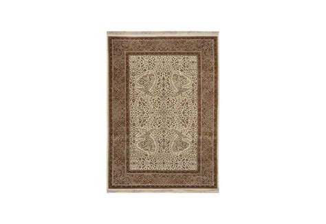 beige  brown rug   intricate design   bottom  front