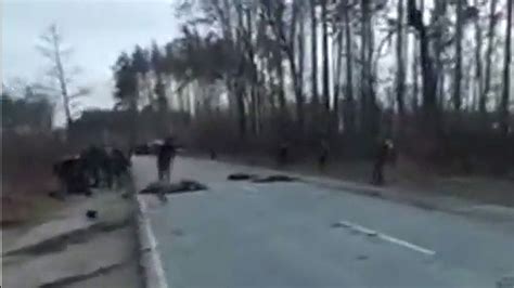 Graphic Video Appears To Show Ukrainian Troops Killing Russian Soldiers