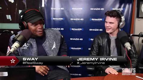 jeremy irvine speaks on 1st ever sex scene what socks he wore and michael douglas sway s