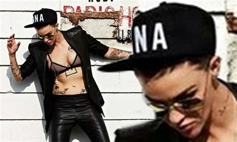 ruby rose slips into see through bikini top to promote us