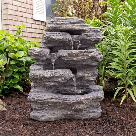 outdoor water fountain  cascading waterfall natural  stone  soothing sound