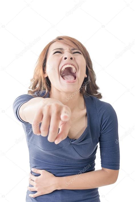 woman pointing  laughing   stock photo  celwynn