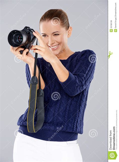 Happy Woman Holding A Professional Camera Royalty Free