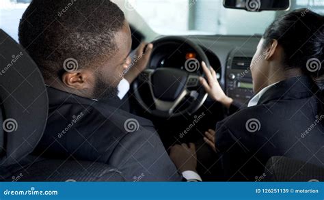 Female Assistant Flirting With Boss In His Car To Move Up Career Ladder