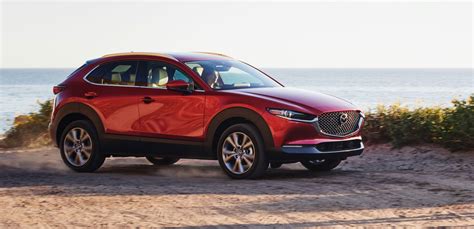 mazda cx  trademark hints   larger coupe  crossover