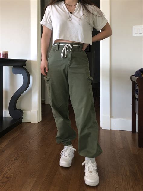 green cargo pants with white crop top layered necklaces army pants