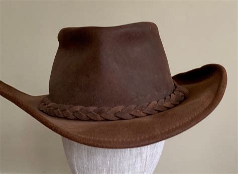 brown leather cowboy hat vintage western braided hat band distressed