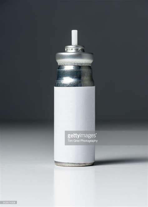 close    asthma inhaler pressurised gas canister   white