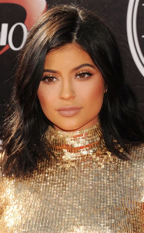kylie jenner s hair evolution from brown to blue to yellow see her