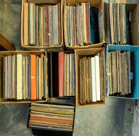 a large collection of vinyl lp records in 8 boxes including rock pop