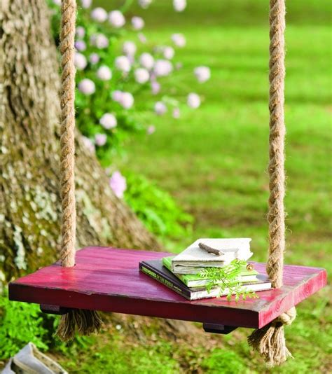 rope tree swing  wooden seat fresh garden decor