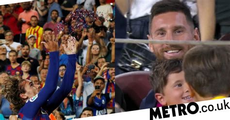 lionel messi beams from crowd watching antoine griezmann s unusual