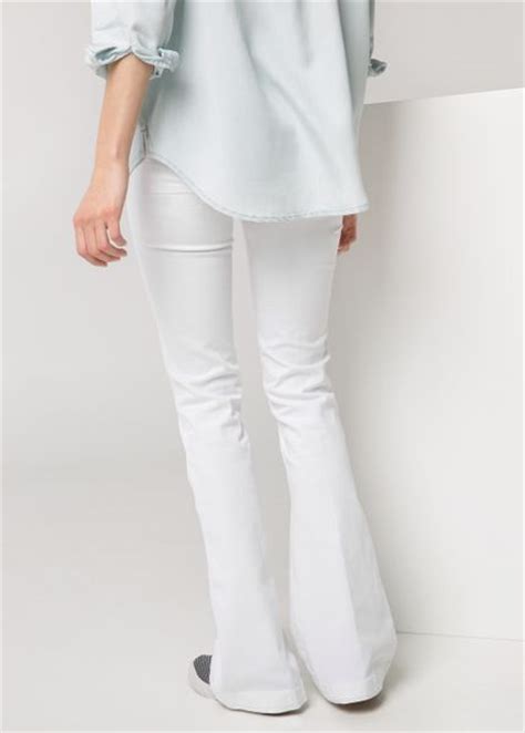 mango flared flare jeans in white lyst