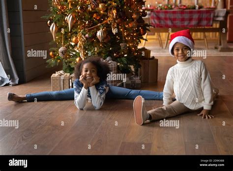 Portrait Smiling African American Siblings Having Fun On Winter Holiday